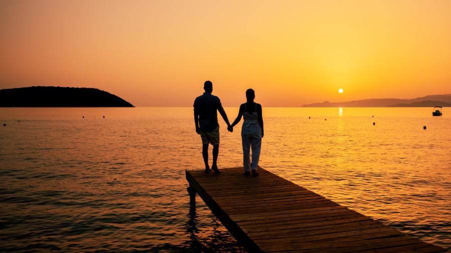 A couple enjoying the sunset in Santorini