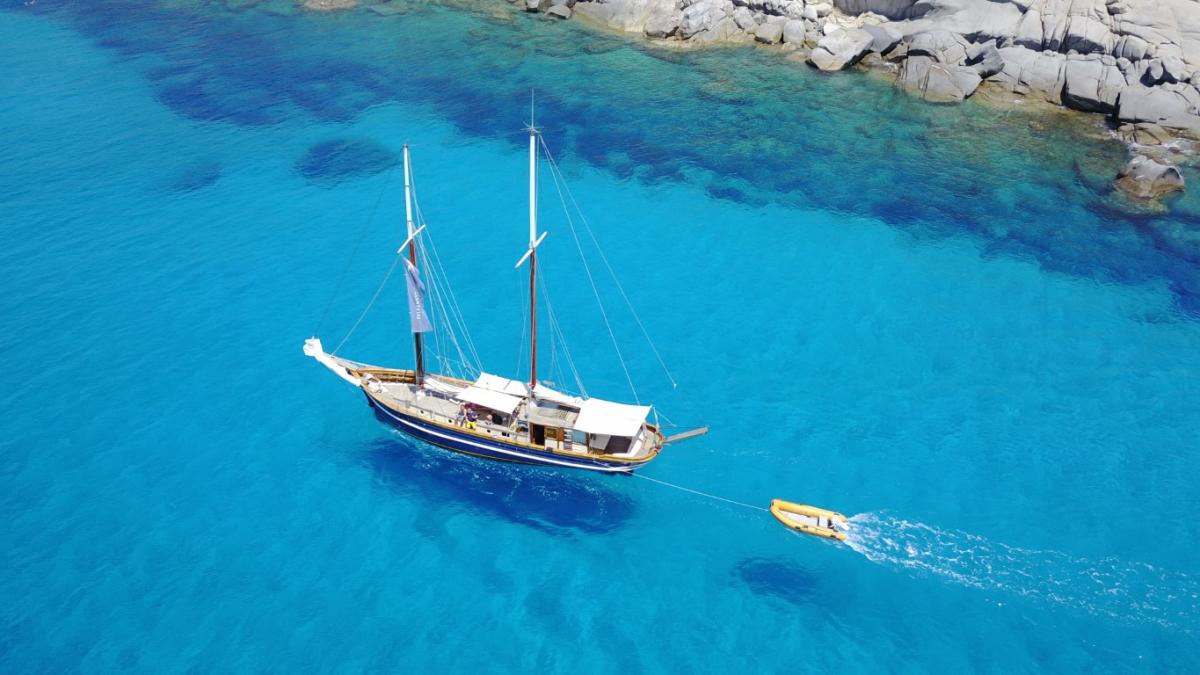 A traditional Turkish gulet sailing in the turquoise waters of the Mediterranean