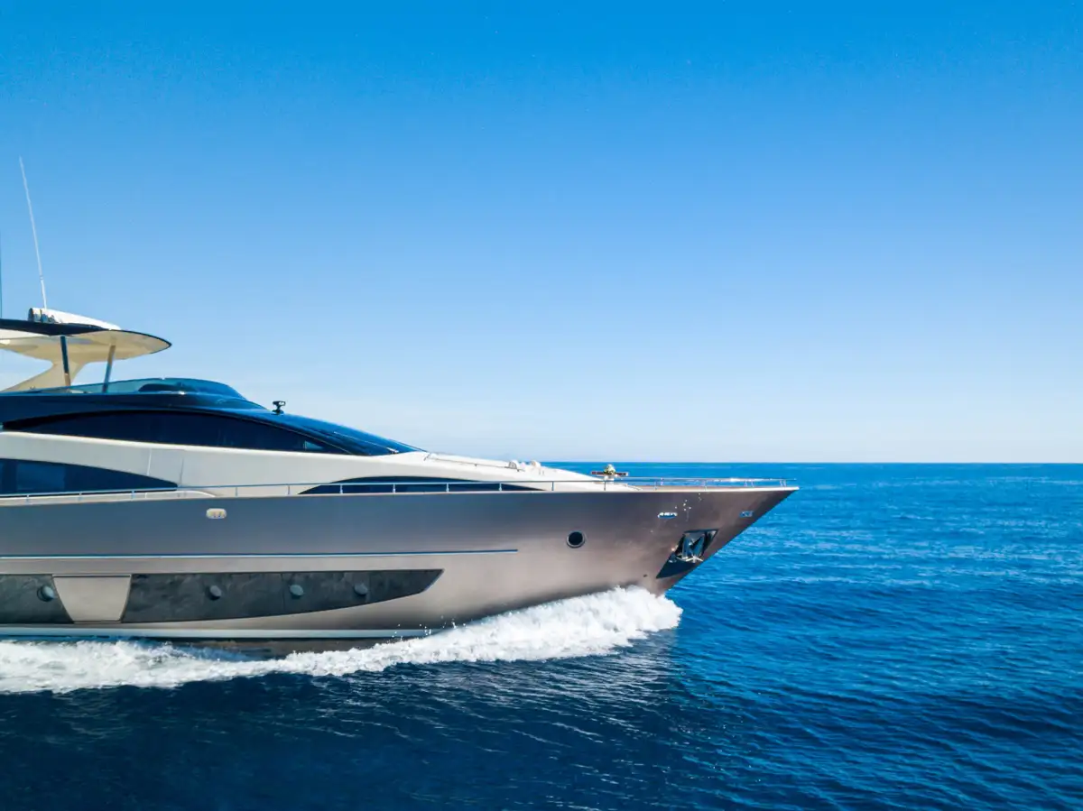 Sleek, modern superyacht with minimalist design and advanced technology similar to Elon Musk's charter preferences